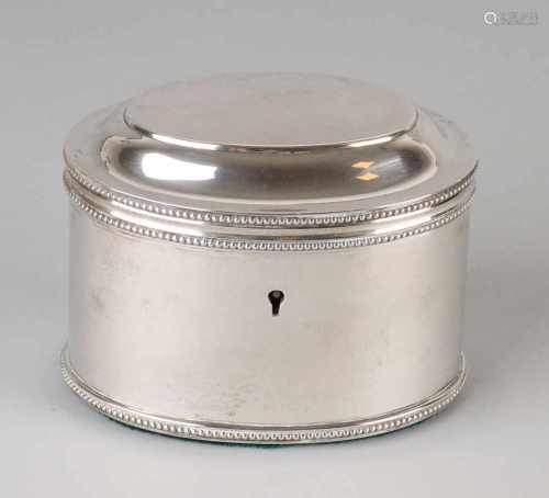 Silver tea chest, 833/000, oval model with pearl border. Equipped with hinged cover with lock, key