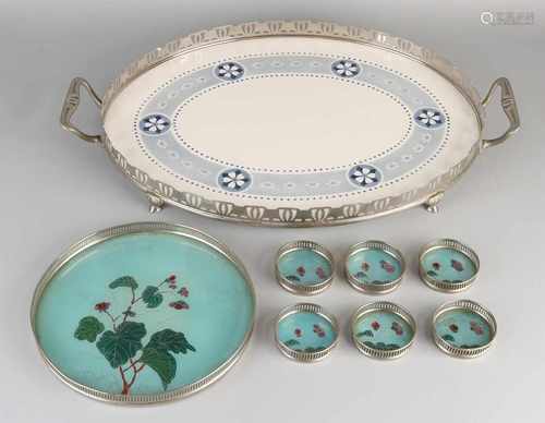 Eight parts of ceramic. Jugendstil. Circa 1915. Comprising: Large salver white / blue hairline.