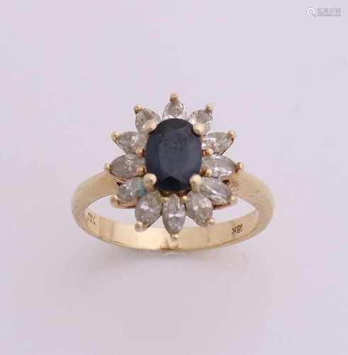 Yellow gold ring, 585/000, with sapphire and diamond. Ring with an oval rosette in the middle an