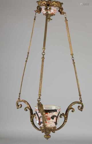 19th Century gilt bronze jardineire with Imari porcelain pot. (1 chip) 71x37 cm in reasonable good