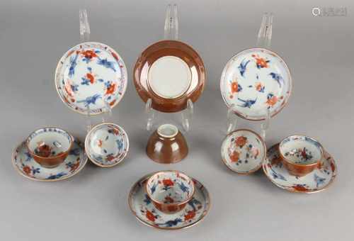 Six 18th century Chinese porcelain cups and saucers with floral Capuchin / bird decor. Three cups