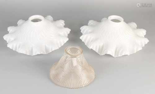 Three antique glass lampshades. Approximately 1915- 1920. Two times opaline glass cap + one time cut