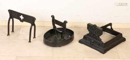 Three antique cast iron boots-scrapers. 19th century. Size: 25-36 cm. In good condition.