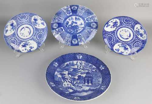 Four Japanese porcelain plates with floral / landscape decor. Circa 1900. Size: Ø 23,5 - 31 cm. In