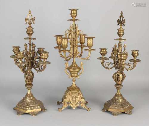 Three antique brass candle candlesticks historicism. Approximately 1890. Size: H 44-46 cm. In good