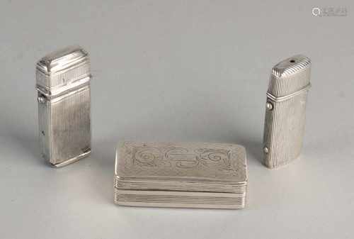 Three silver boxes, 833/000. Two sulfur stick boxes with ribdecor and a rectangular snuff box with