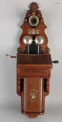 Antique walnut hanging telephone from Stockholm by L. M. Ericsson & Co. Size: hornless 75 x 22 x