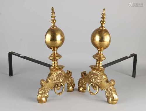 Two brass fire bucks with lion heads. First half 20th century. Size: 37 x 36 x 22 cm. In good