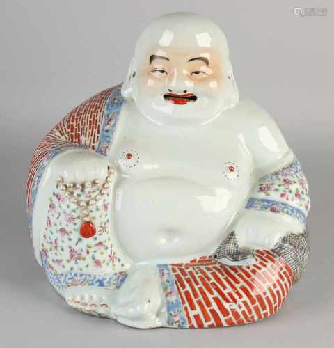 Large antique Chinese porcelain laughing Buddha with soil marks and Family Rose decor. Size: 29 x 27