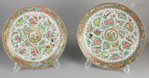 Two large Chinese porcelain Family Rose Cantonese dishes. 19th century. Floral / birds / insects