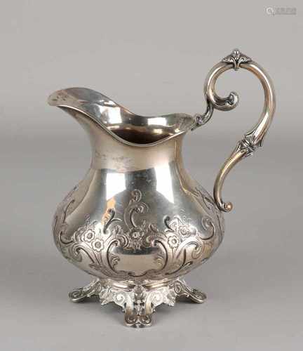 Silver milk jug, 13 lothige, 812.5 / 000, decorated with C-volutes, placed on an open-work base with