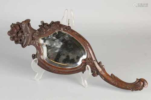 19th Century Rococo walnut inserted hand mirror. With the original faceted mirror. Dimensions: L