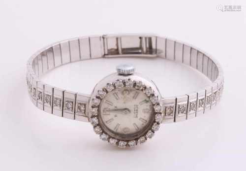 White gold watch, 750/000, with diamonds. Womens watch with a round case, ø 18 mm, provided with a