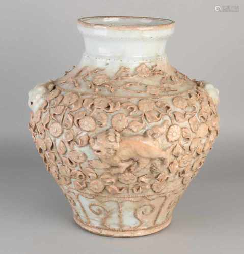 Large Chinese porcelain vase with flowers and reprocessed Foo dogs. White-brown glaze. Minimal