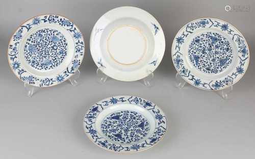 Four 18th century Chinese porcelain plates with parsley / peonies decor. Two plates hairline.