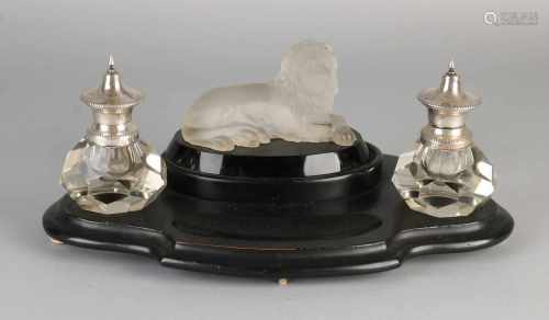 Ink set on wooden base, features a glass reclining lion with two crystal ink wells fitted with a