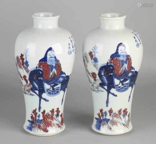 Two old Chinese porcelain vases with text and figures in landscape decor. Six signs bottom mark.