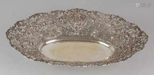 Large silver serving platter, 800/000, oval-cut model with floral decor and cartouchen with putti.