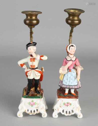 Two 19th century French porcelain candle candlesticks with bronze. Approximately 1850. Size: 22.5 cm