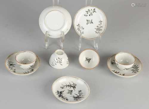 18th Century Chinese porcelain cups and saucers with manganese colored floral decors. Consisting