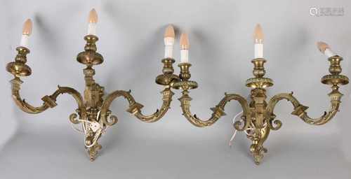 Two large gilt bronze three-arm wall lamps in Louis XVI style. Approximately 1900. Size: 50 x 60 x