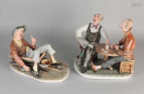 Two large bisquit porcelain figures. Second half 20th century. One time drunken man in