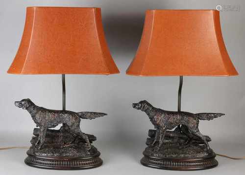 Two decorative table lamps with hounds. Composition, plastic. Source colored patina. Second half