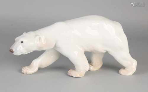 Large Danish porcelain Bing & Grøndahl polar bear. Nr. 1785 R. 20th Century. Size: 14 x 28 x 8 cm.