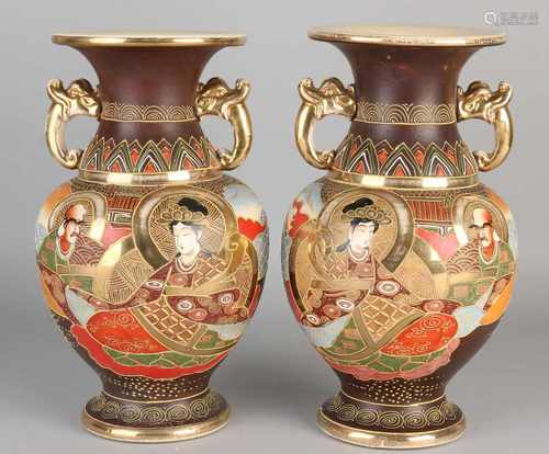 Two antique Japanese Satsuma vases with figures / gold decor. Circa 1930. Dimensions: H 29 cm. In