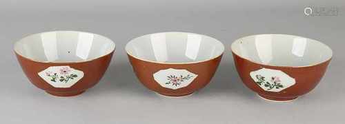 Three 19th century Chinese porcelain Capuchin bowls with floral decor. Size: 6 - ø 12 cm. In good