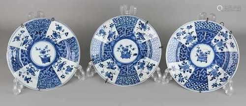 Three 18th century Chinese porcelain plates with floral / decor swastika. Her Lines and chip.