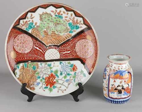 Twice Japanese Imari porcelain. 19th century. Consisting of: Vase with Figures decors and bottom