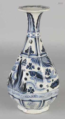 Chinese porcelain blue and white octagonal vase with sturgeon / floral decoration. Size: H 26 cm. In