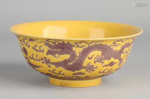 Yellow porcelain drakenkom with yellow frosting and six characters and bottom mark. 6,7x15.5Ø in