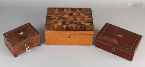 Three 19th-century wooden covered boxes. Twice mahogany bandintarsia + keys. One time walnut