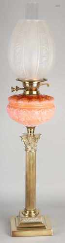 Big standing brass oil lamp in the shape of a Corinthian column. With edited glass reservoir and