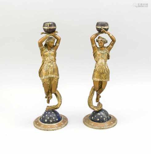 Two antique bronze metal candle composition candlesticks with floating angels. Circa 1870.