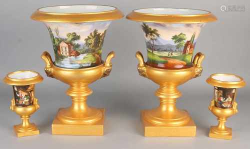 Two sets of 19th century porcelain vases Empire crater. Moderate restored and repainted. Size: 17-34