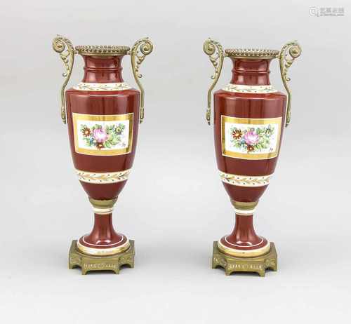 Two antique French porcelain vases with bronze fixtures. Hand painted with floral / gold decor.