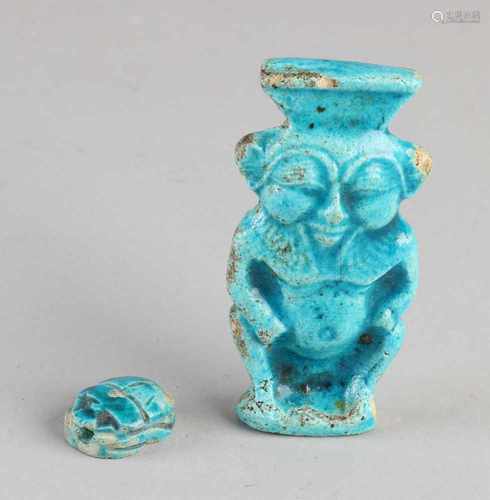 Two ancient Egyptian blue glazed ceramic figures. One time scarab amulet. One times monkey-like