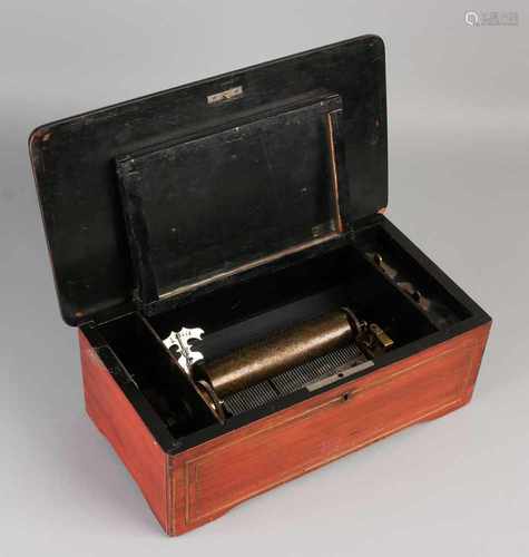 Antique rosewood Swiss music box with six melodies. One tooth broken. Approximately 1880. Size: 13 x