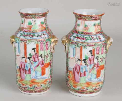 Two 19th century Chinese porcelain vases Cantonese Family Rose with figures and gold decor. One vase