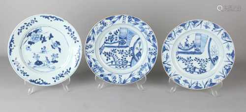 Three 18th century Chinese porcelain plates with garden decor. All chips and one hairline. Size: ø