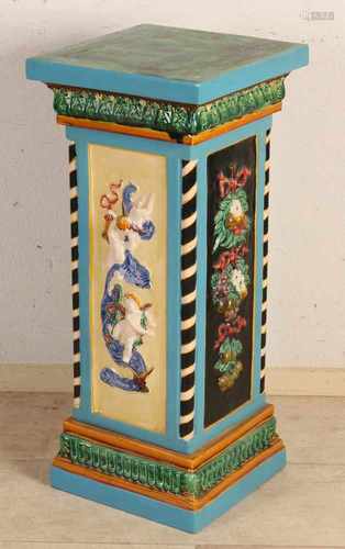 Large Majolica pedestal with floral / putti decor. 20th century. Size: 78 x 34 x 34 cm. In good