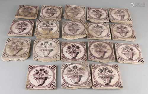 18 Pieces Hollandse 19th century manganese flowerpot tiles. Damages edge. Size: 13 x 13 cm. In