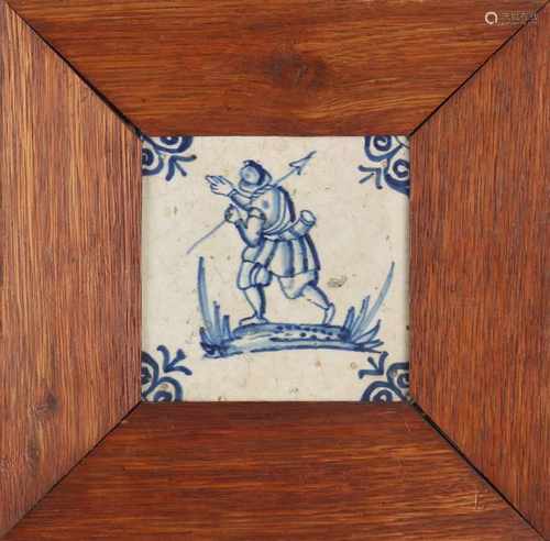 17th Century Dutch thick wall tile with an image of infantryman with spear. Dimensions: H 13 x W