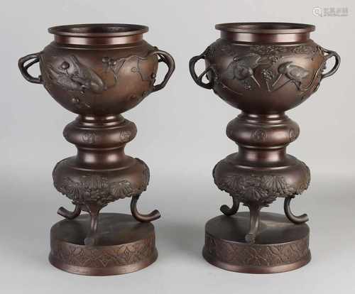 Two 19th century Japanese bronze flower pots with birds / berry vines decors. Dimensions: H 40 x Ø