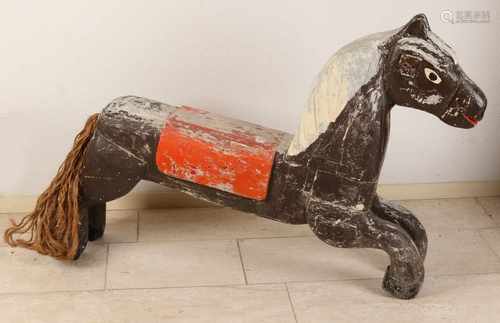 Antique wooden painted fairground horse. Approximately 1930. Size: 80 x 115 x 25 cm. In fair /