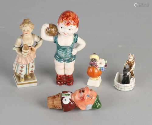 Five parts antique German porcelain. Comprising: Woman with flowerpot, Volkstedt 19th century