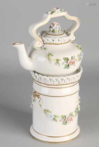 Naples Italian porcelain teapot + Comfoor with worked roses decor. 20th century. Size: H 28 cm. In